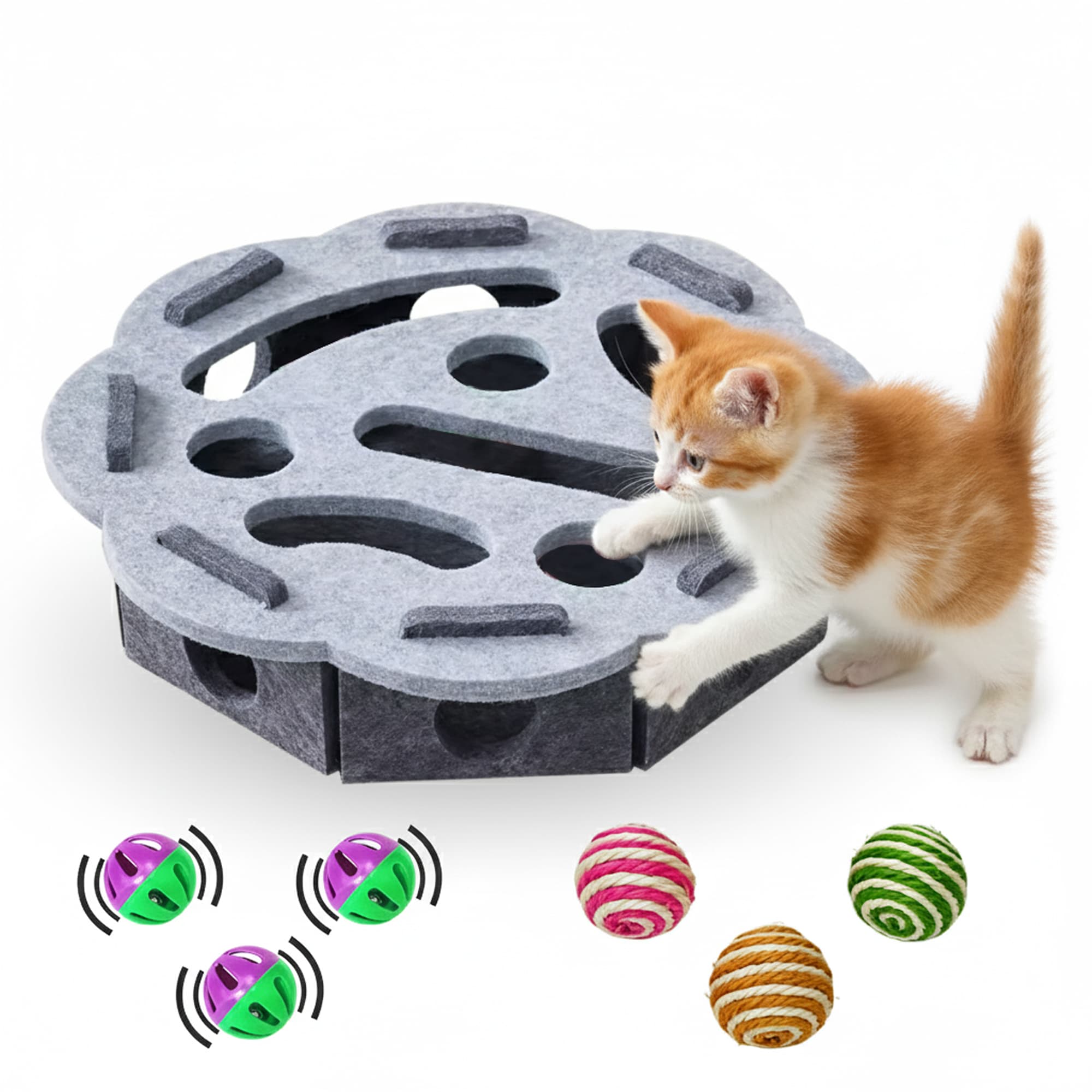 Playful kitten exploring a felt puzzle toy